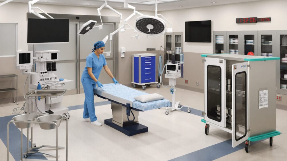 Nurse in hospital OR wearing infection prevention gear and smoothing sheet on operating table