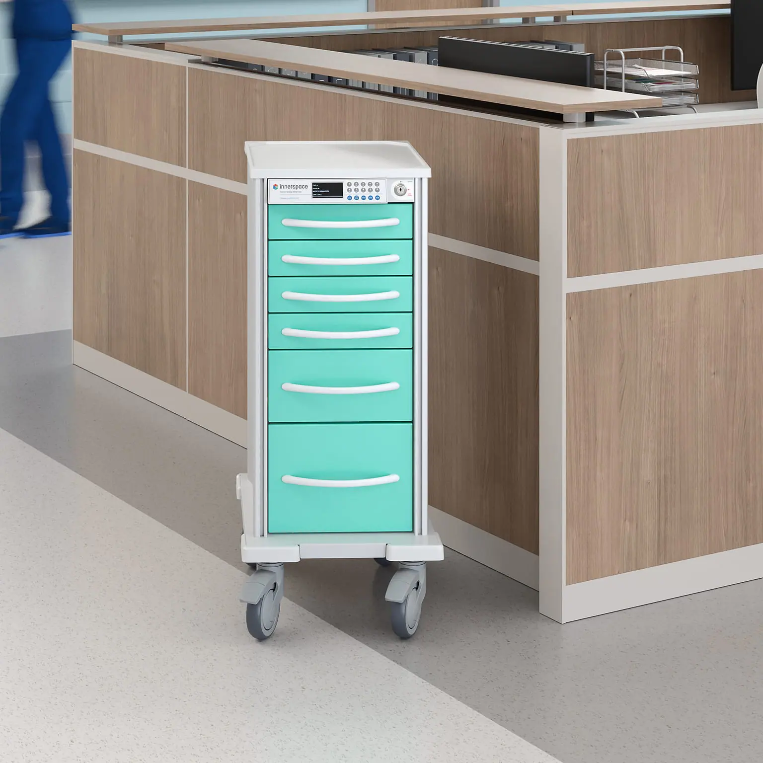 Pace narrow carts in meadow drawers at nurse station